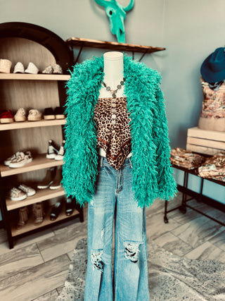 Teal fur coat